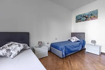 Letto o letti in una camera di GuestHost - Calasetta-Nice Apartment near Sottotorre beach!
