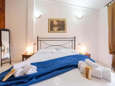 Letto o letti in una camera di Villasimius Coastal Nest
