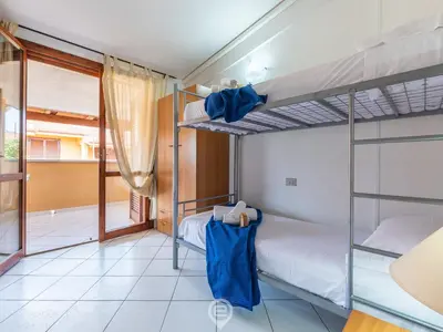 Letto o letti in una camera di Villasimius Coastal Nest