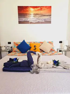 Letto o letti in una camera di Casa Beatrice