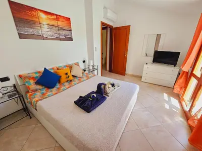 Letto o letti in una camera di Casa Beatrice