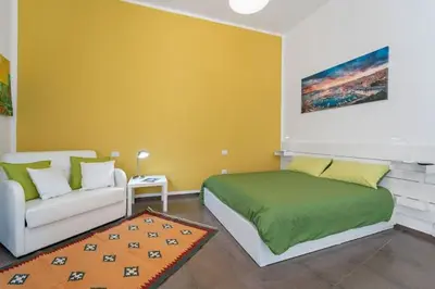 Letto o letti in una camera di HomeToLove Marina