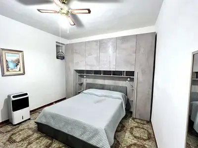 Letto o letti in una camera di Casa GIOIA nel cuore di Carloforte; Wifi e AC