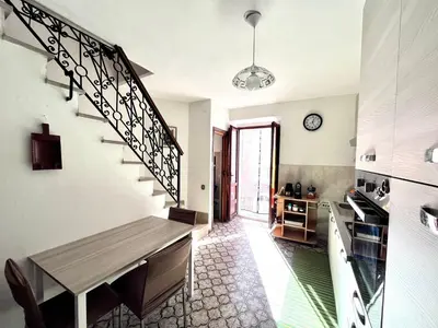 Cucina o angolo cottura di Casa GIOIA nel cuore di Carloforte; Wifi e AC