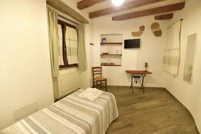 TV o dispositivi per l'intrattenimento presso Casa Vacanze Nonno Antioco - USO ESCLUSIVO