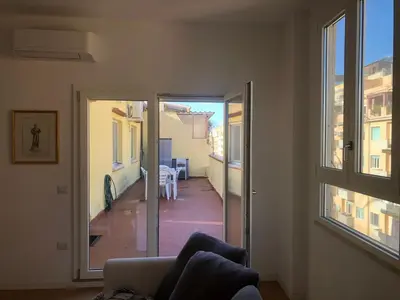 Area soggiorno di Cadorna Attico San Benedetto