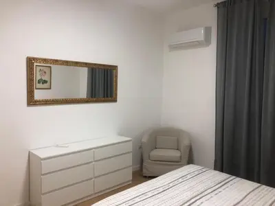 Letto o letti in una camera di Cadorna Attico San Benedetto
