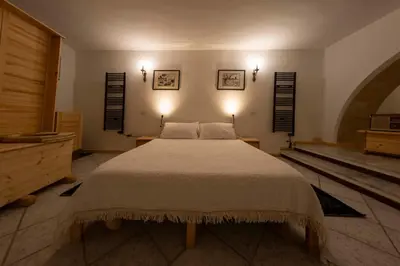 Letto o letti in una camera di DIMORA MADONNA DELLA SPERANZA