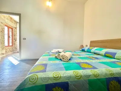 Letto o letti in una camera di Casa in Paese