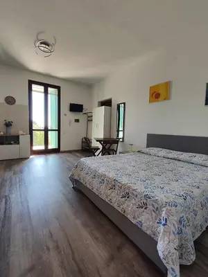 Letto o letti in una camera di Un Angolo di Mare in Sardegna