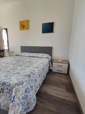 Letto o letti in una camera di Un Angolo di Mare in Sardegna