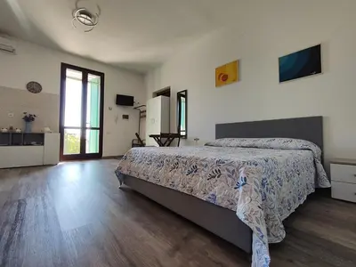 Letto o letti in una camera di Un Angolo di Mare in Sardegna