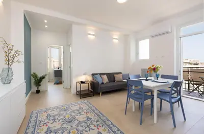 Area soggiorno di Sve Suites Cagliari