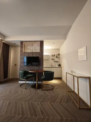 TV o dispositivi per l'intrattenimento presso Oasi City Center Luxury Apartments