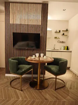 Area soggiorno di Oasi City Center Luxury Apartments