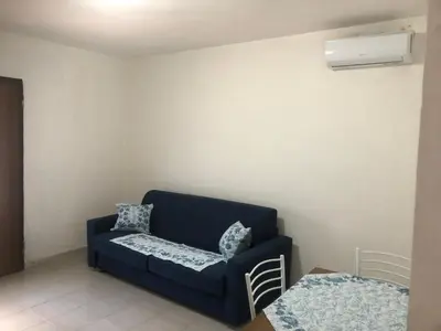 Area soggiorno di Blue Apartment