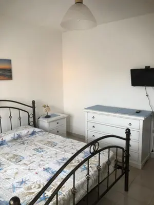 Letto o letti in una camera di Blue Apartment