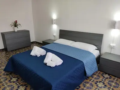 Letto o letti in una camera di Eleonora d'Arborea
