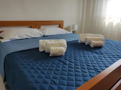 Letto o letti in una camera di Eleonora d'Arborea