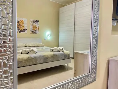 Letto o letti in una camera di Casa Nina - 10' dalla spiaggia