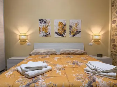 Letto o letti in una camera di Casa Nina - 10' dalla spiaggia