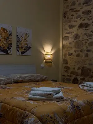 Letto o letti in una camera di Casa Nina - 10' dalla spiaggia