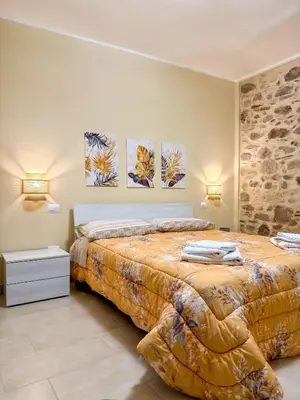 Letto o letti in una camera di Casa Nina - 10' dalla spiaggia