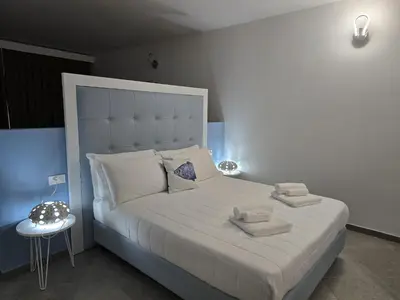 Letto o letti in una camera di Domo Annalisa
