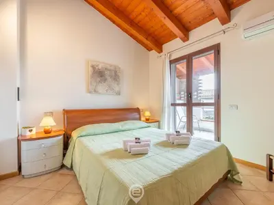 Letto o letti in una camera di Maria Grazia's Holiday Home