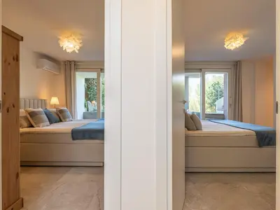 Letto o letti in una camera di Villa Eden