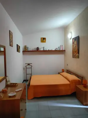 Letto o letti in una camera di Casa Vacanze I Borghi