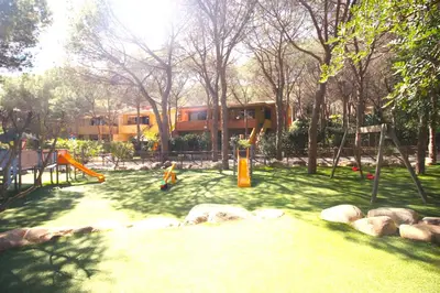 Area giochi per bambini di Easy Flat Sardinia Sky Blue Home (Pinus Village)