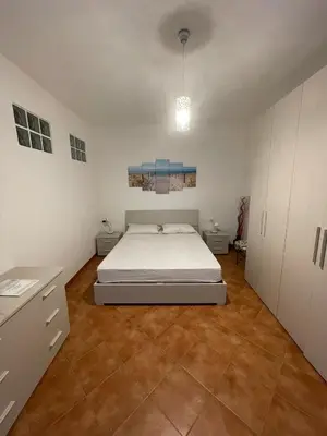 Letto o letti in una camera di Casa Tabarka