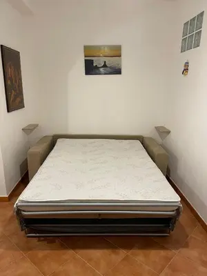 Letto o letti in una camera di Casa Tabarka