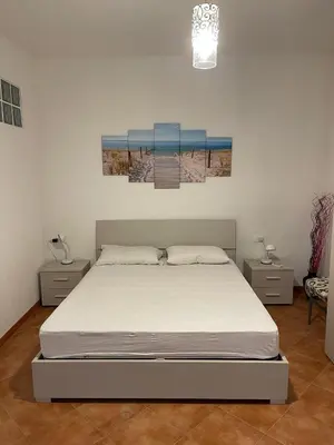 Letto o letti in una camera di Casa Tabarka