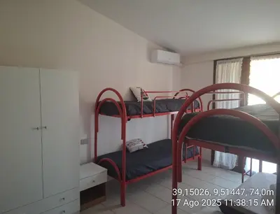 Letto o letti in una camera di casa vacanze