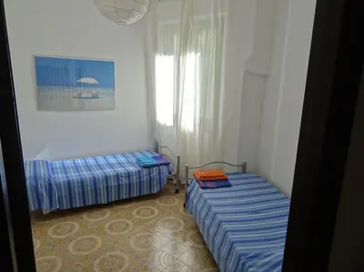 Letto o letti in una camera di Beautiful house close to the sea and Forte Village