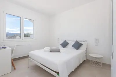 Letto o letti in una camera di Villa Greca Holiday Rooms