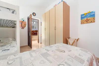 Letto o letti in una camera di Casa Vacanze a pochi passi dal mare , Sant'Antioco