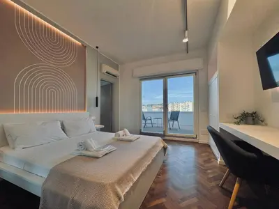 Letto o letti in una camera di Mameli View Cagliari