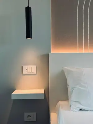 Letto o letti in una camera di Mameli View Cagliari