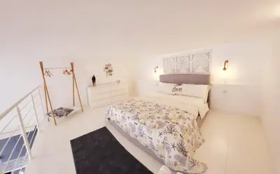 Letto o letti in una camera di La Perla Blu