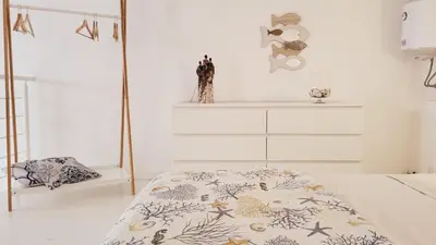 Letto o letti in una camera di La Perla Blu