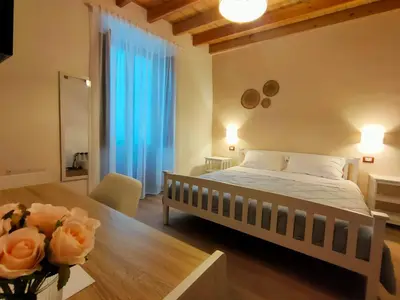 Letto o letti in una camera di Donna Raffaela