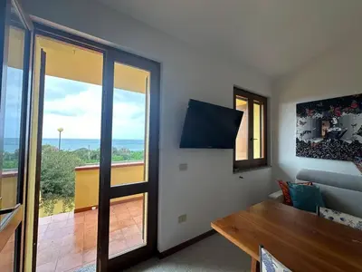 TV o dispositivi per l'intrattenimento presso [Funtana Meiga - Windsurf Panorama] 50 mt from sea