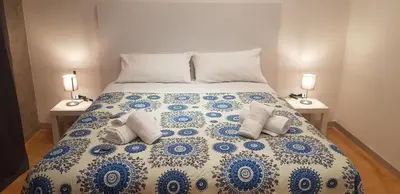 Letto o letti in una camera di CasaAlma