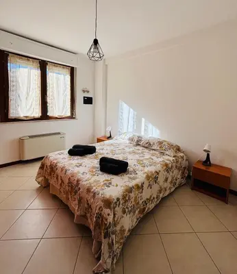 Letto o letti in una camera di Casa Tirso