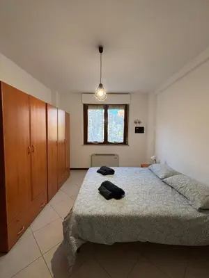Letto o letti in una camera di Casa Tirso