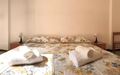Letto o letti in una camera di Casa Tirso