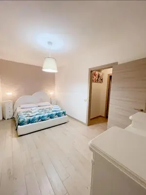 Letto o letti in una camera di Casa Vacanze Nerea - Relax e Mare vicino a Cagliari in Sardegna